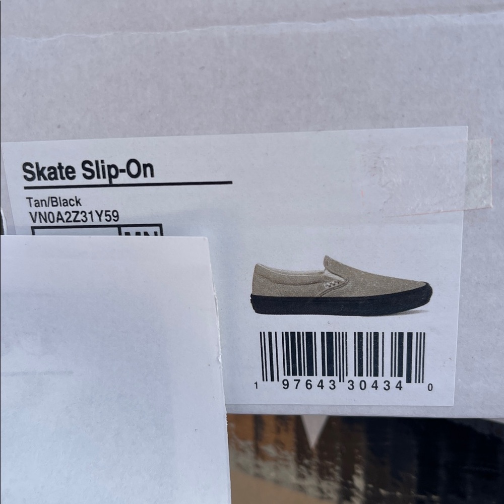 Vans Men's Skate Slip-On
Tan/Black Sneakers
VN0A2Z31Y59
Beige Slip-On Sneakers - Picture 16 of 16